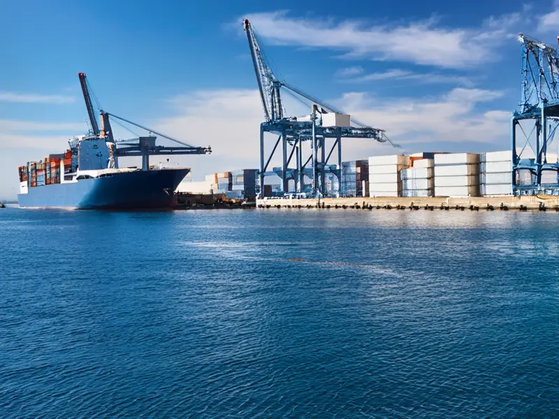 Another maritime terminal with a boat arriving